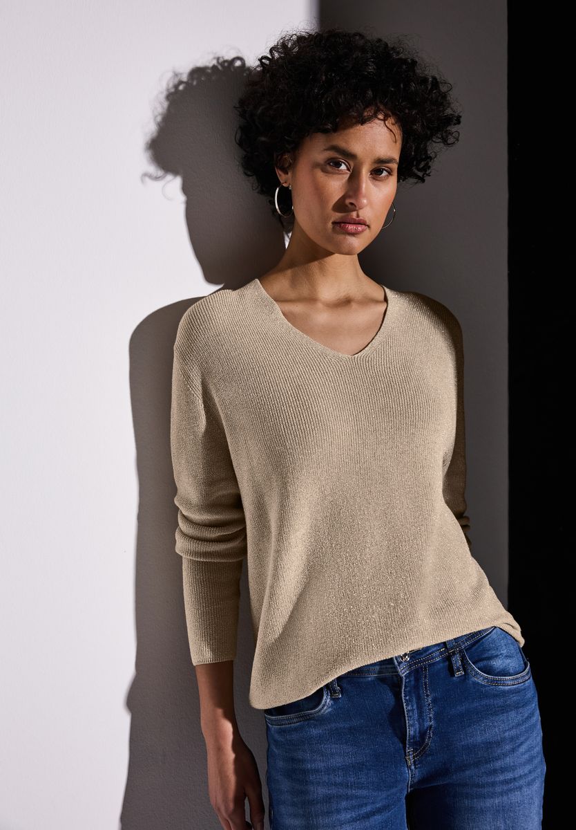 Glitzernder Pullover