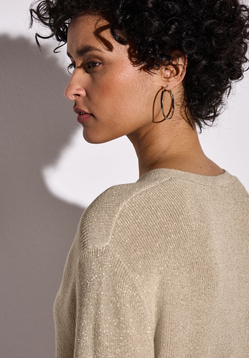 Glitzernder Pullover