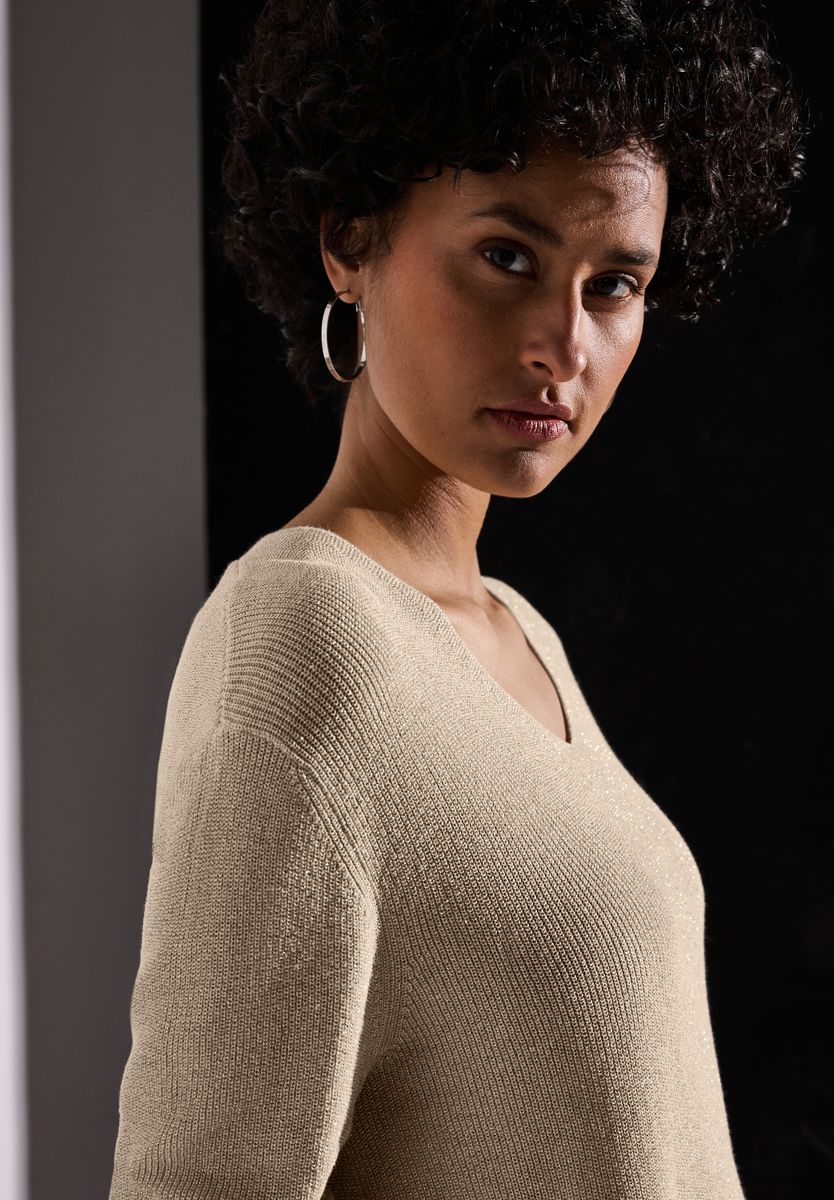 Glitzernder Pullover