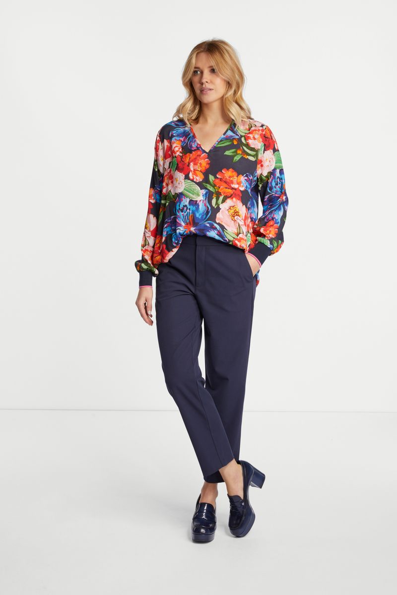 printed V-neck blouse with knit cuffs