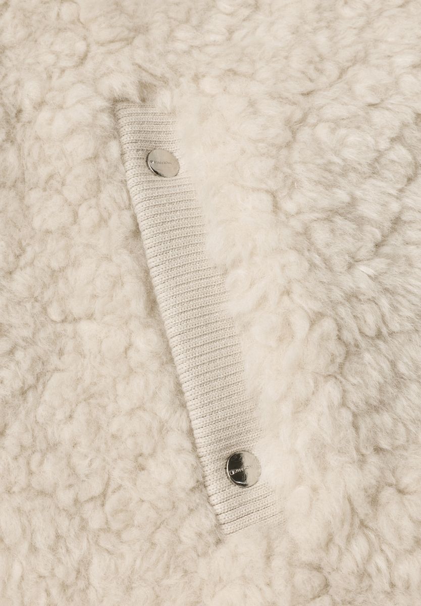 Fake Fur Weste mit Strickdetails